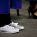 Valedictorian Meagan Winkelseth dons glittery shoes during the Ypsilanti High School Commencement at the Convocation Center on Tuesday, June 4. This is the 164th and final graduating class. Daniel Brenner I AnnArbor.com